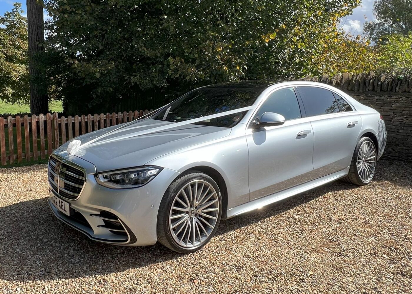 S-class Mercedes wedding car with ribbons