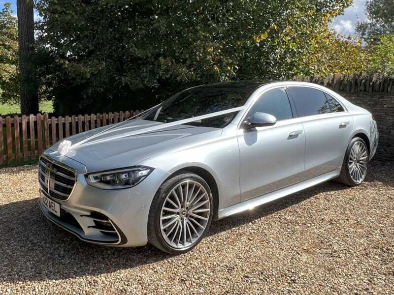 S-class Mercedes wedding car with ribbons