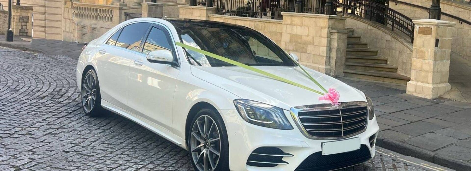 White Mercedes wedding car